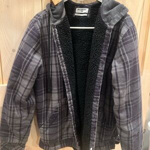 This is a Billabong men's sherpa-lined hooded flannel shirt jacket